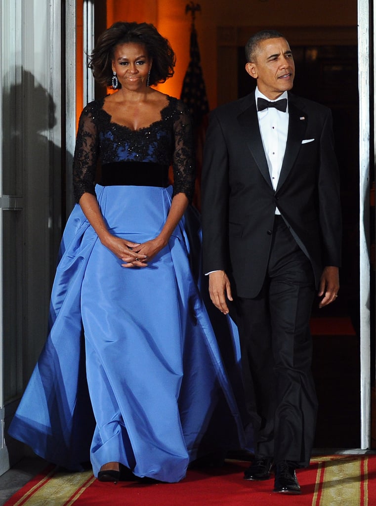 Wearing Carolina Herrera to a state dinner with French President Francois Hollande in 2014.
