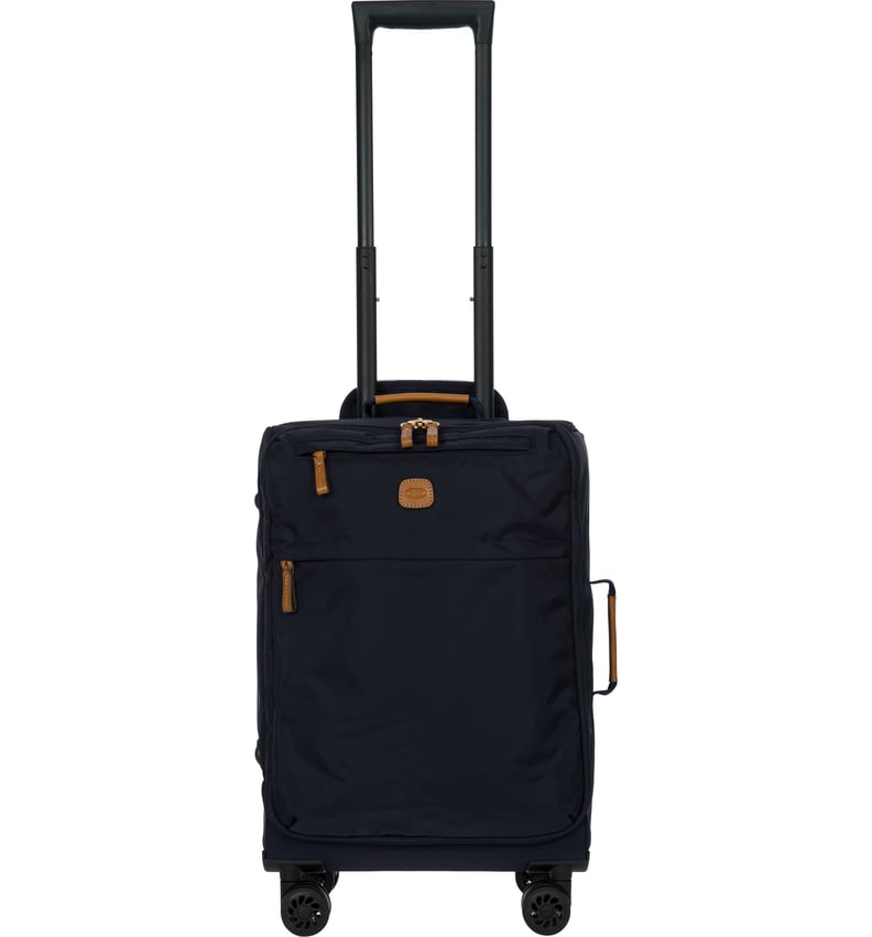 Review: the Sleek $225 Away Carry-on Suitcase Charges Your Phone and Only  Weighs 7 Pounds