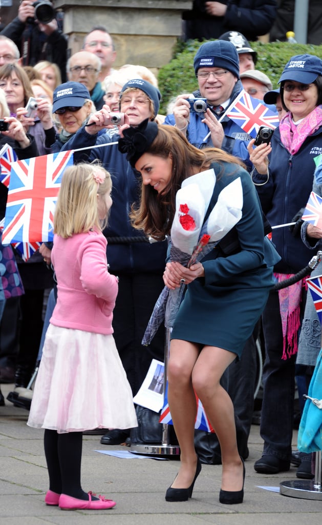 Before Kate Middleton embarked on the Diamond Jubilee tour in March 2012, she chatted with wellwishers — including this cute little girl — outside Leicester Cathedral in England.