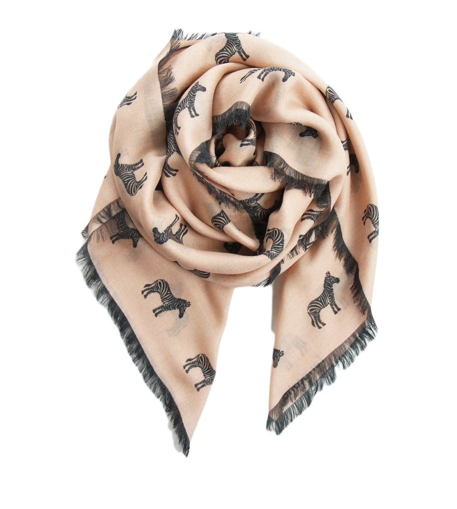 "Everyone always goes for the blanket scarf in Winter and I have plenty, which is why I'm going a different route and looking into a lightweight cashmere blend option from Terracotta New York ($108). I've had my eye on the brand for awhile now and seeing this fun zebra print just makes me want one even more." — ML