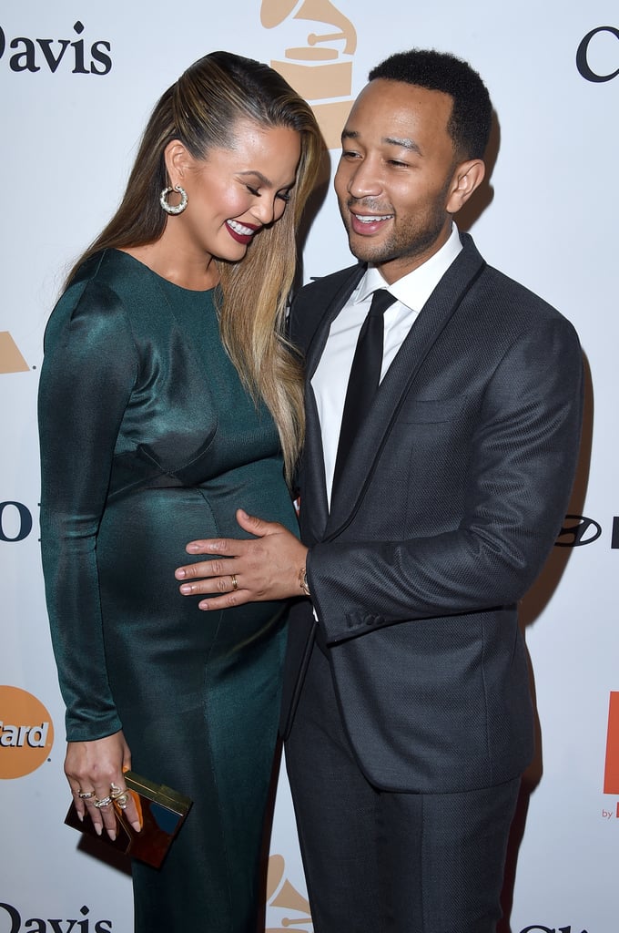 Chrissy Teigen and John Legend continued their reign as the world's most enviable couple when they attended Clive Davis's annual pre-Grammys party in LA on Sunday night. The couple, who is currently expecting their first child, played up their PDA on the red carpet; John kept his hand on Chrissy's growing baby bump, which she flaunted in a body-hugging Galvan mermaid dress. They brought their relationship goals inside, where they met up with fellow couples Ciara and Russell Wilson and Christina Aguilera and Matthew Rutler, snapped silly selfies, and swayed to the music together. 
John and Chrissy's sweet Valentine's Day date is just the latest in a series of joint outings they've made this month. Most recently, Chrissy accompanied John at the NAACP Image Awards, where he was honoured with the president's award for his ongoing humanitarian efforts. The fun will continue for the pair at Monday night's Grammys, where John is nominated for four awards. Keep reading to see more photos of Chrissy and John's fun-filled evening.