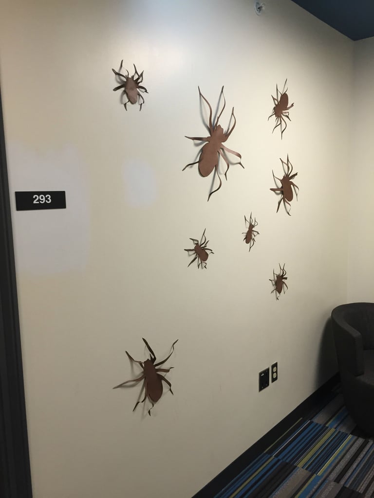 "A series of spiders near the end of the hall. I think giving their legs a '3D effect' really helps make them pop and stand-out."