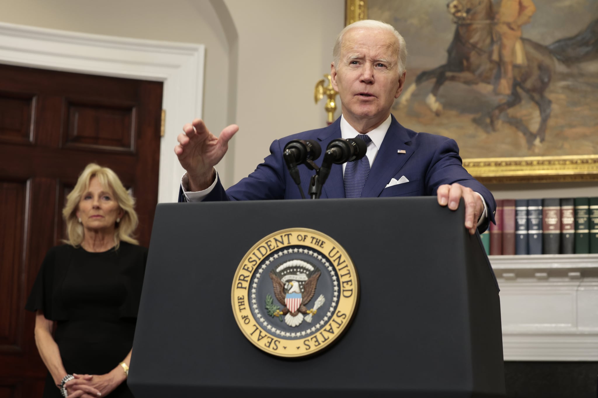 WASHINGTON, DC - MAY 24: US President Joe Biden delivers remarks from the Roosevelt Room of the White House as First Lady Jill Biden looks at the mass shooting at an elementary school in Texas on May 24, 2022 in Washington, DC.  Eighteen people were killed after a gunman opened fire today at Robb Elementary School in Ovaldi, Texas, according to published reports.  (Photo by Anna Moneymaker/Getty Images)
