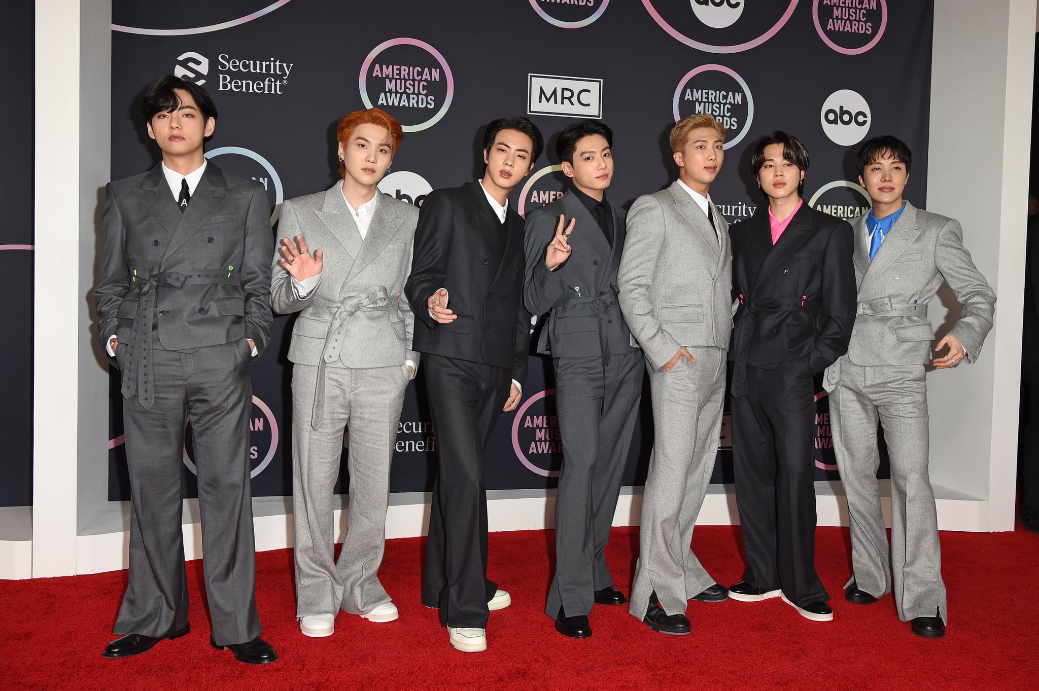 LOS ANGELES, CALIFORNIA - NOVEMBER 21: (L-R) V, Suga, Jin, Jungkook, RM, Jimin, and J-Hope of BTS attend the 2021 American Music Awards at Microsoft Theatre on November 21, 2021 in Los Angeles, California. (Photo by Axelle/Bauer-Griffin/FilmMagic)