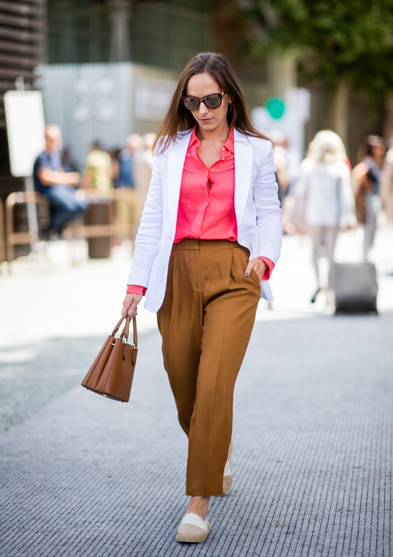 Style a Simple Pair With Trousers With a Pink Blouse and White Blazer