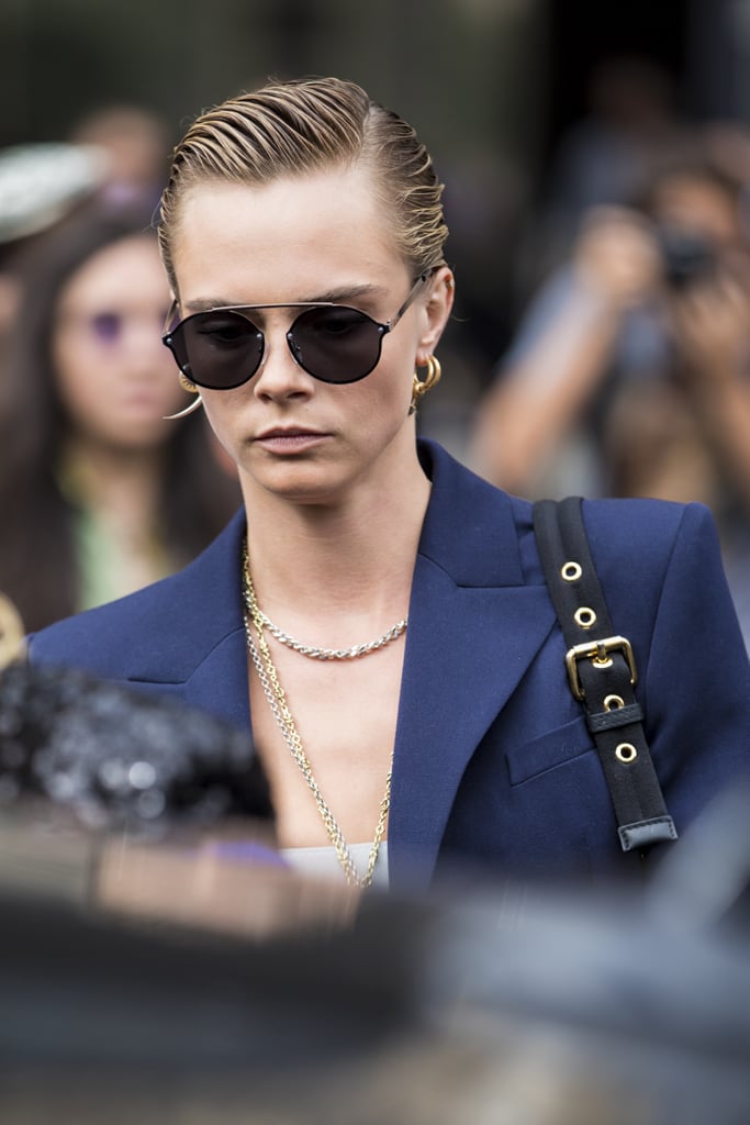 Cara Delevingne Wore Oversize Aviators and a Blue Blazer as She Left the Balmain Show