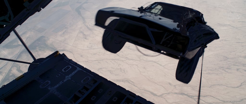 Cars. Out of an airplane.