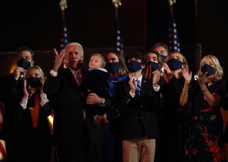 WILMINGTON, DELAWARE - NOVEMBER 07:  President-elect Joe Biden and family watch fireworks from stage after Biden's address to the nation from the Chase Center November 07, 2020 in Wilmington, Delaware. After four days of counting the high volume of mail-i