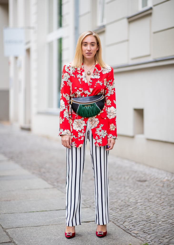 Stripes, florals, a fanny pack, and Manolos? This floral outfit really is kind of groundbreaking.