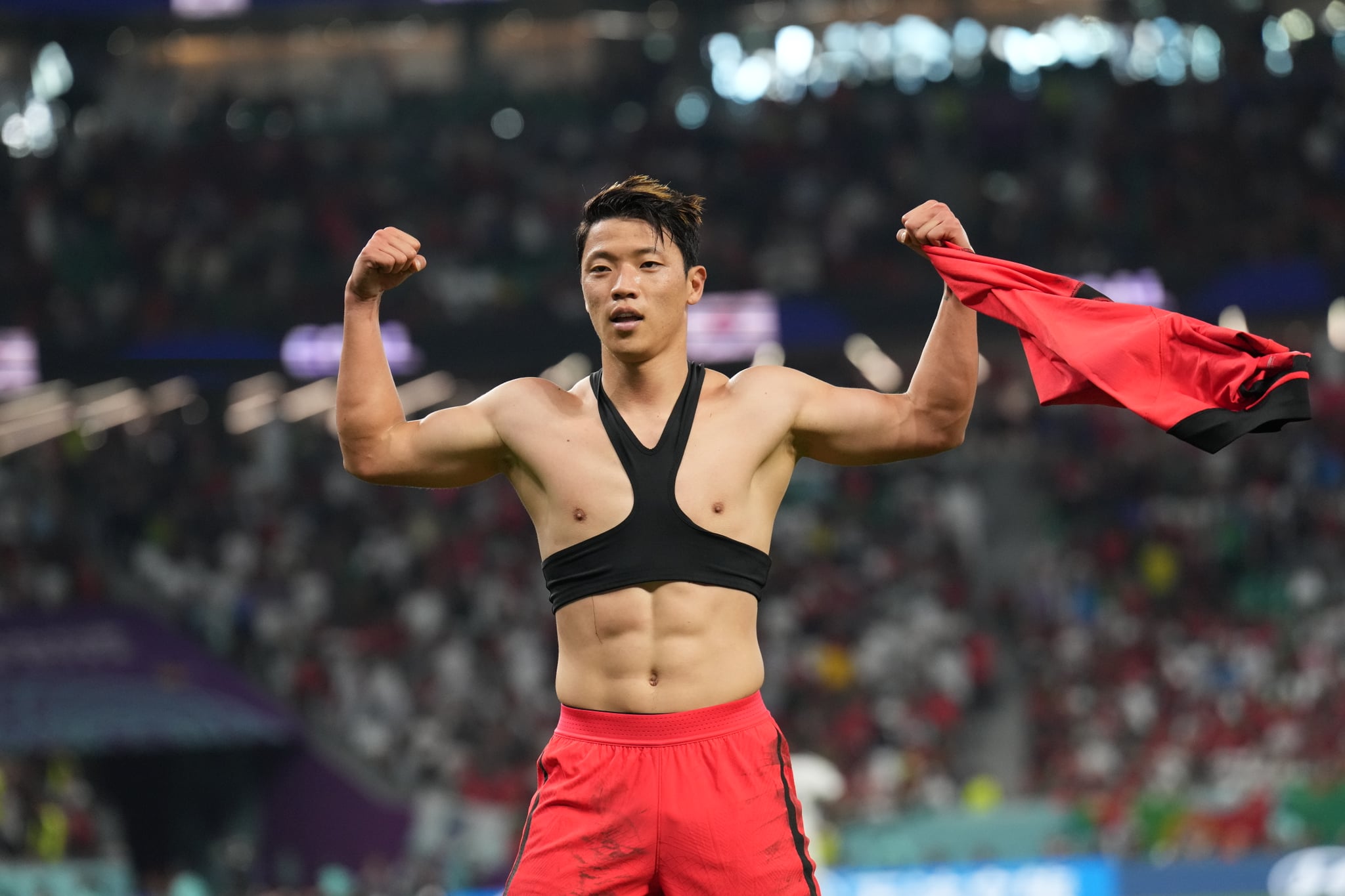 AL RAYYAN, QATAR - DECEMBER 02: Hwang Hee-chan of Korea celebrates after scoring their second goal during the FIFA World Cup Qatar 2022 Group H match between Korea Republic and Portugal at Education City Stadium on December 02, 2022 in Al Rayyan, Qatar. (Photo by Amin Mohammad Jamali/Getty Images)