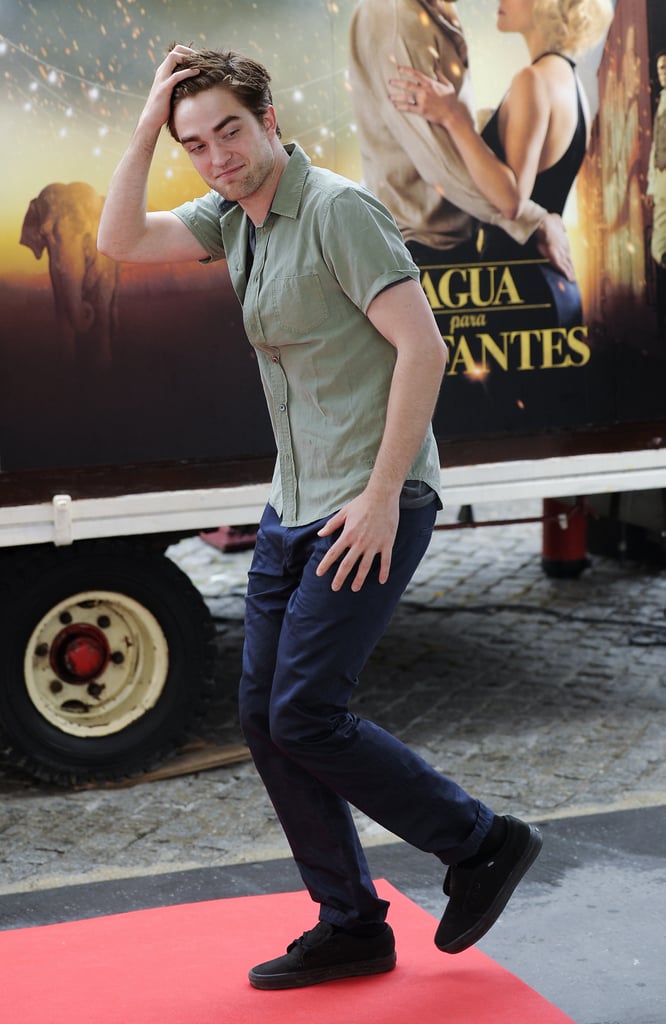 The Water For Elephants star gave fans a jolt of excitement when he brushed back his hair during a stop in Barcelona in May 2011.