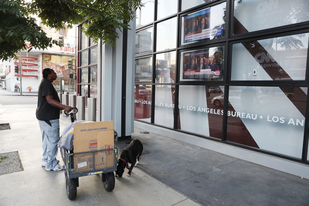 A man watches the hearing in Los Angeles.