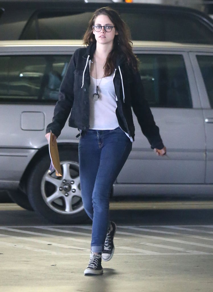 Kristen made her way through the parking garage.