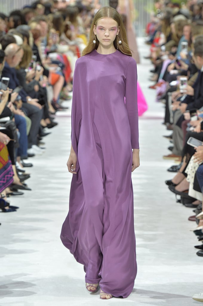We'd love to see Amal in this fluid grape-hue dress. The material drapes beautifully, and it's such a classic shape that would work for any occasion.