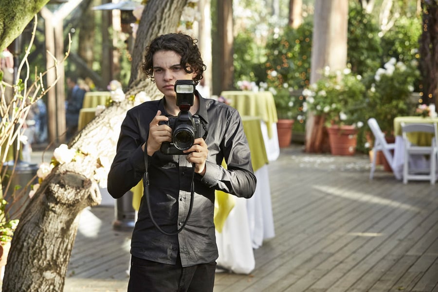 Max has finally found his calling as a wedding photographer.