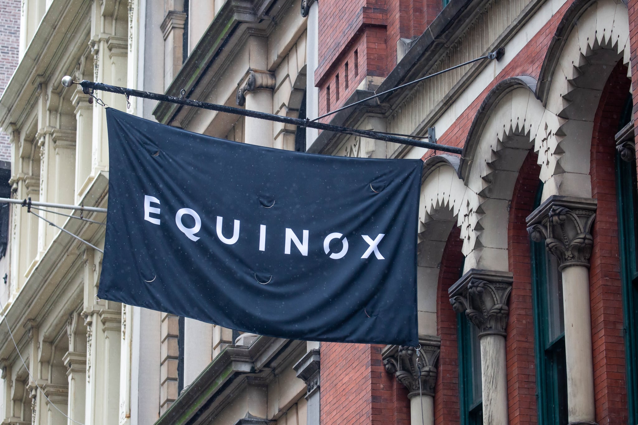 Signage outside an Equinox gym location in New York, U.S., on Wednesday, May 5, 2021. Equinox Holdings, the luxury gym operator popular among financiers and celebrities, has held talks to go public by merging with a blank-check company backed by investor Chamath Palihapitiya, according to people with knowledge of the matter. Photographer: Michael Nagle/Bloomberg via Getty Images