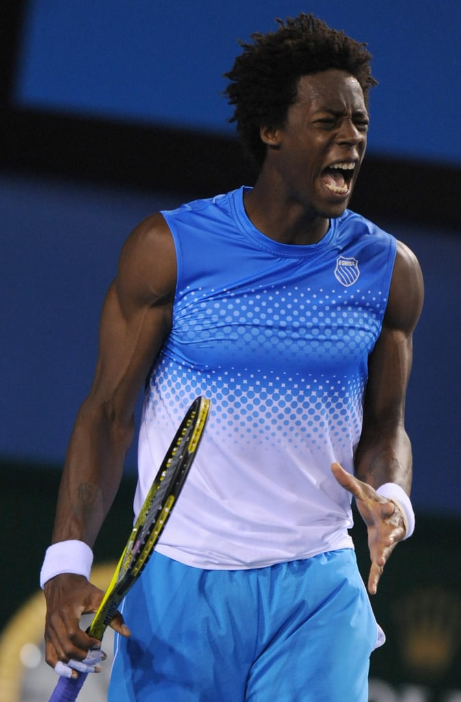 Gael Monfils is one of the best dressed male tennis players as seen here in his white and blue shirts and shorts.