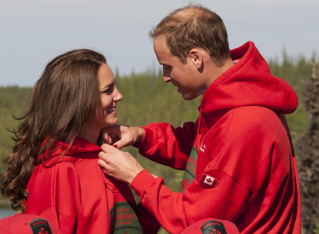 William adorably helped Kate adjust her jacket during their royal tour of Canada in July 2011.