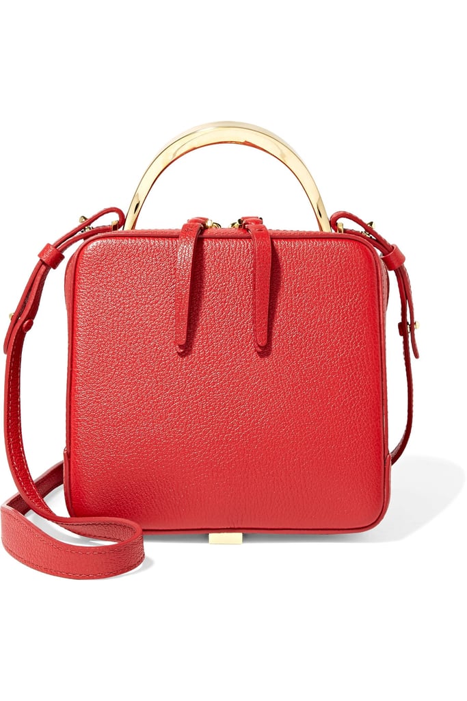 In fire-engine red, this The Volon Cube Mini Textured-Leather Shoulder Bag ($765) was meant to make a statement everywhere.
