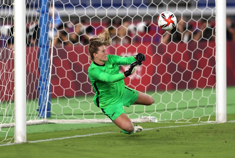 YOKOHAMA, JAPAN - JULY 30: Alyssa Naeher #1 of Team United States saves the fourth penalty from Aniek Nouwen #4 of Team Netherlands during the Women's Quarter Final match between Netherlands and United States on day seven of the Tokyo 2020 Olympic Games a