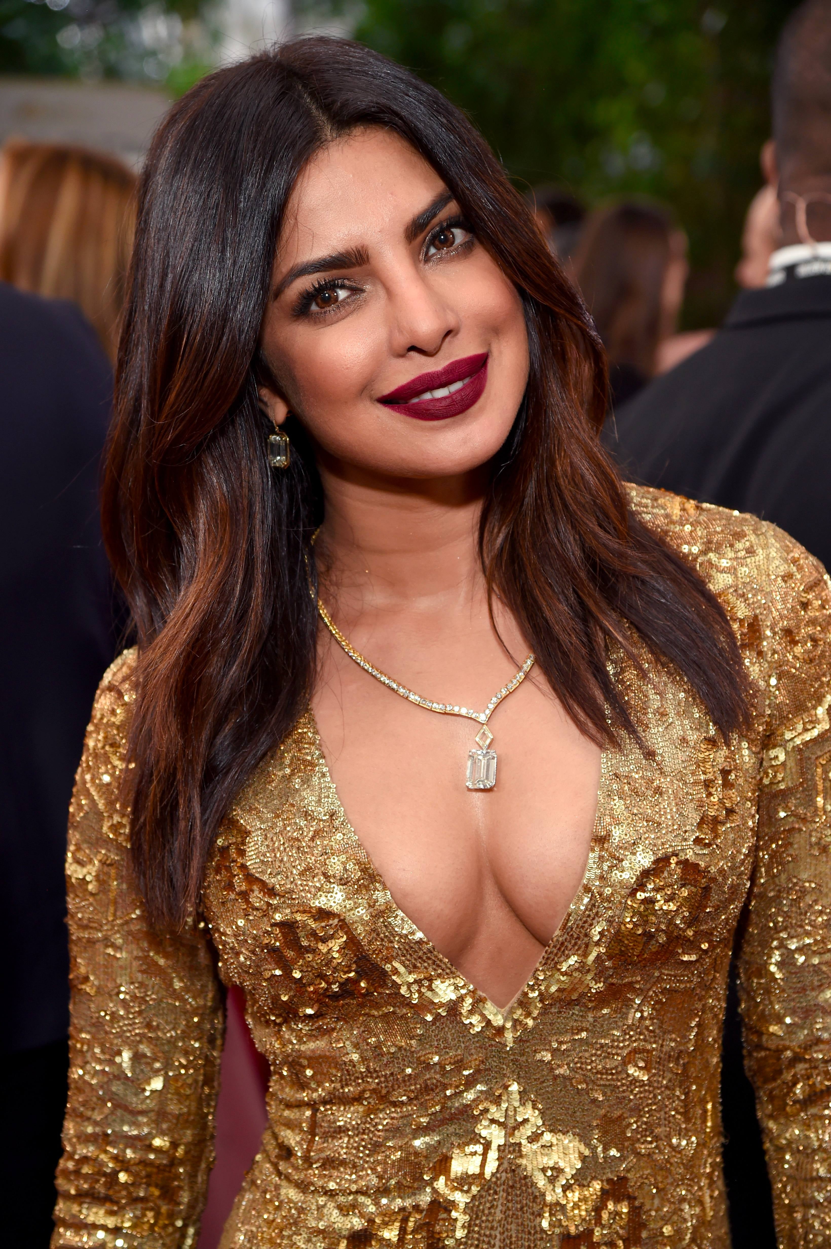 Priyanka golden clearance globe dress
