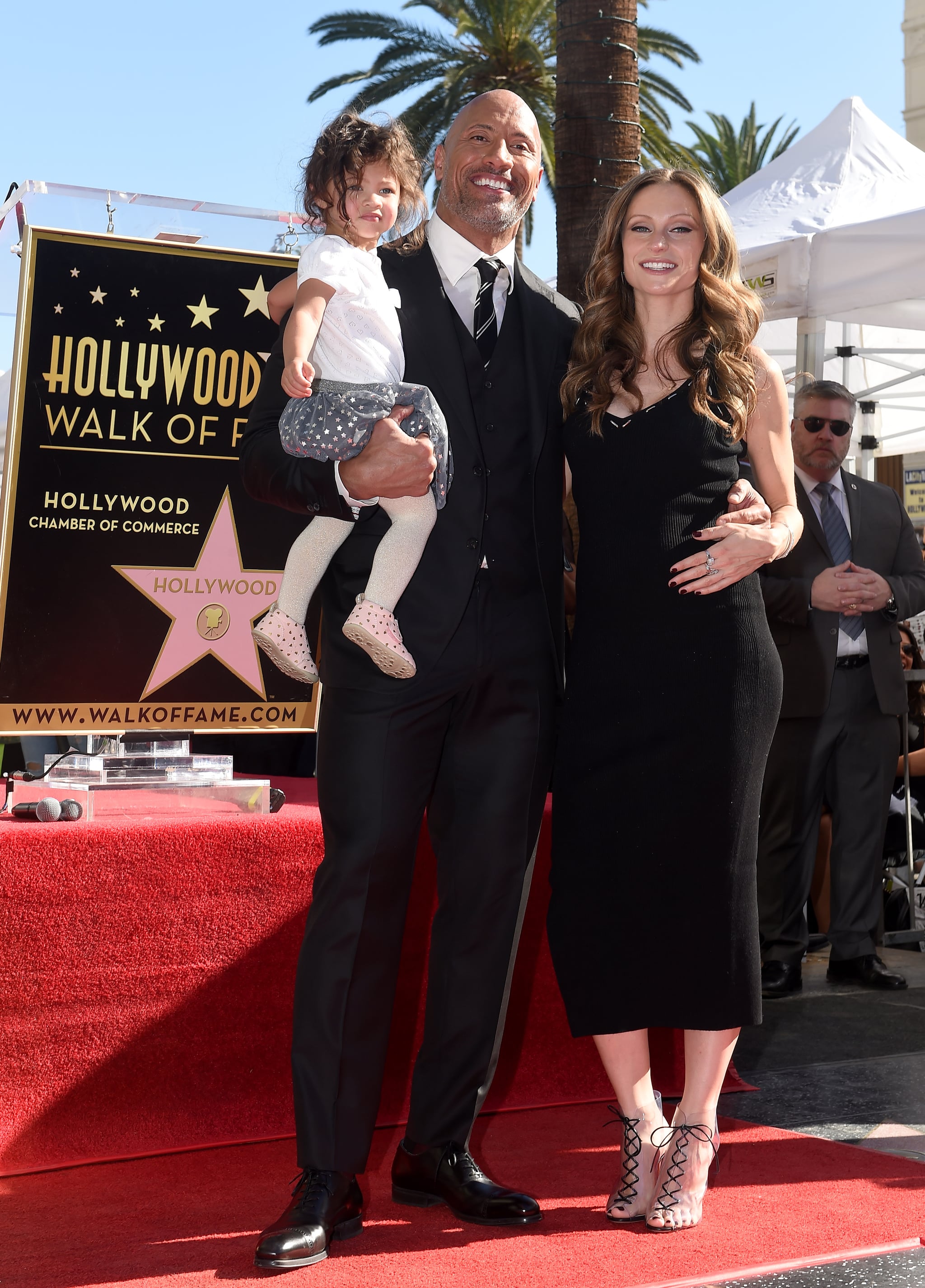 HOLLYWOOD, CA - DECEMBER 13:  Actor Dwayne Johnson, wife Lauren Hashian and daughter Jasmine Johnson attend the ceremony honoring Dwayne Johnson with star on the Hollywood Walk of Fame on December 13, 2017 in Hollywood, California.  (Photo by Axelle/Bauer-Griffin/FilmMagic)