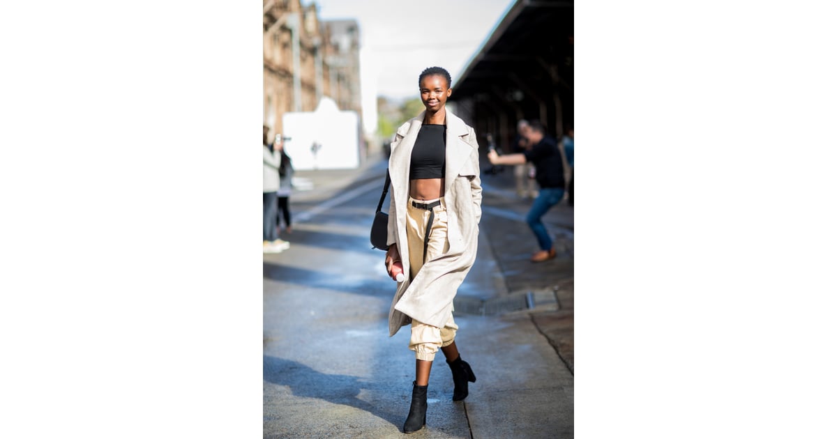 Give Your Trench Coat a Relaxed Look With a Crop Top, Cargo Pants, and