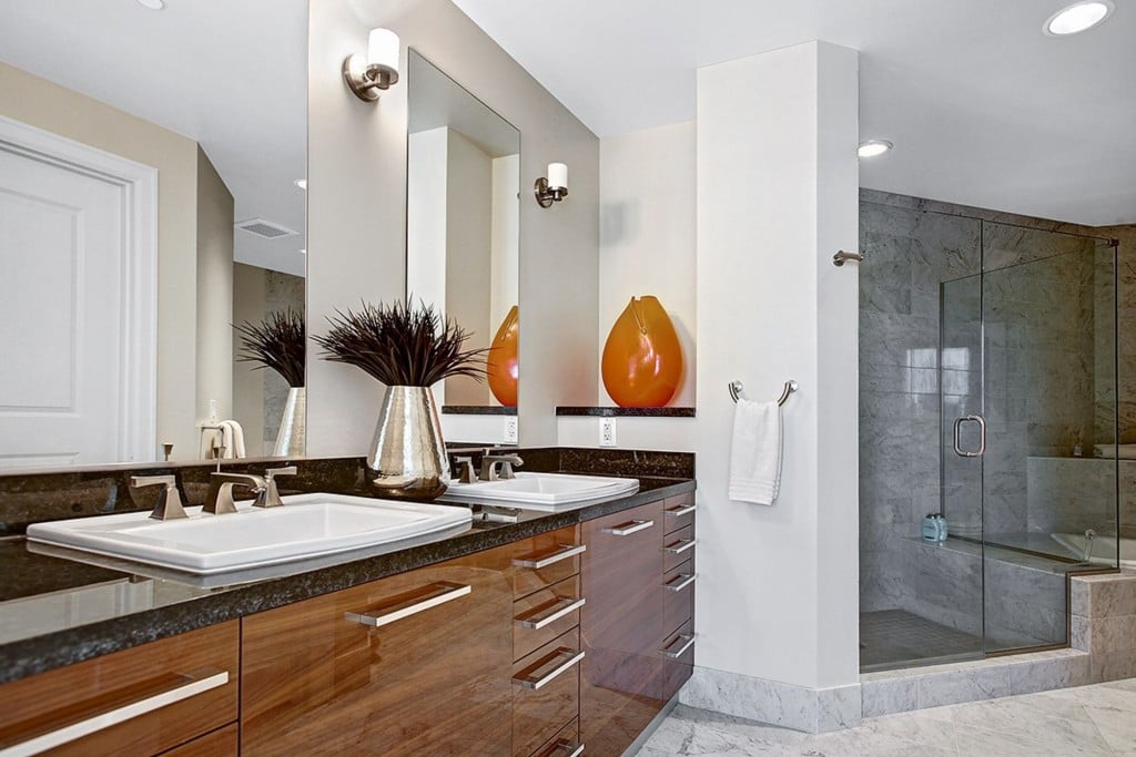 The Bathroom Is Complete With Spa Like Sinks And A Granite