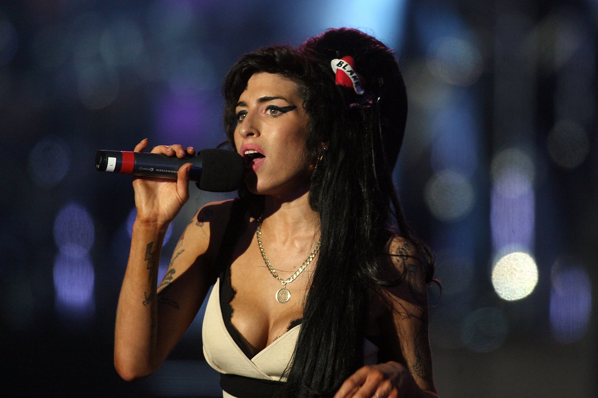 LONDON - JUNE 27:  Amy Winehouse performs during the 46664 concert in celebration of Nelson Mandela's life at Hyde Park on June 27, 2008 in London, England.  (Photo by Dan Kitwood/Getty Images)