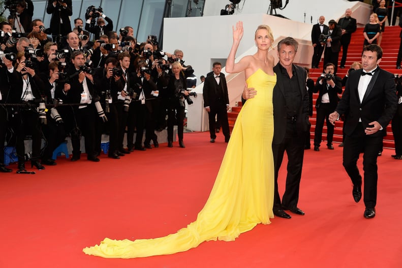 Charlize shines at Cannes while Sean Penn takes a step back