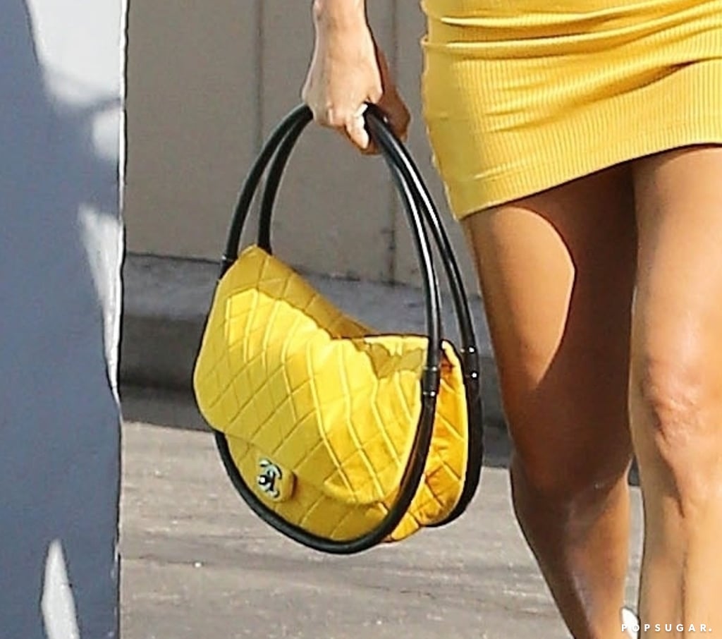 Kourtney Kardashian Yellow Reformation Dress and Chanel Bag