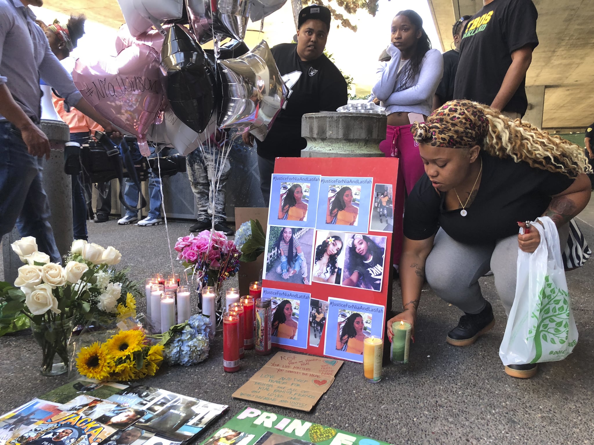 Businessman Essay Malika Harris Places A Candle Down For Her Sister Nia Wilson At A Makeshift Memorial Outside How To Start A Synthesis Essay also English Reflective Essay Example Essay On Nia Wilsons Murder Racism And Sexism Popsugar News Hamlet Essay Thesis
