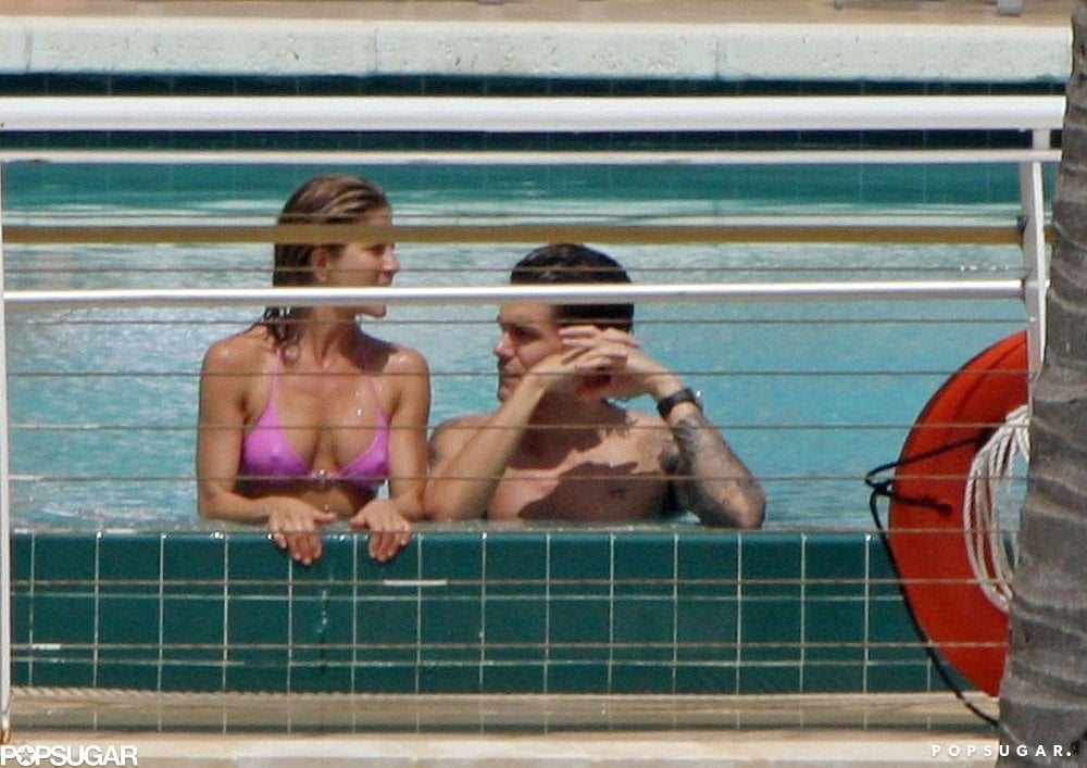 Jennifer soaked up the sun with then-boyfriend John Mayer in a Miami pool in May 2008.