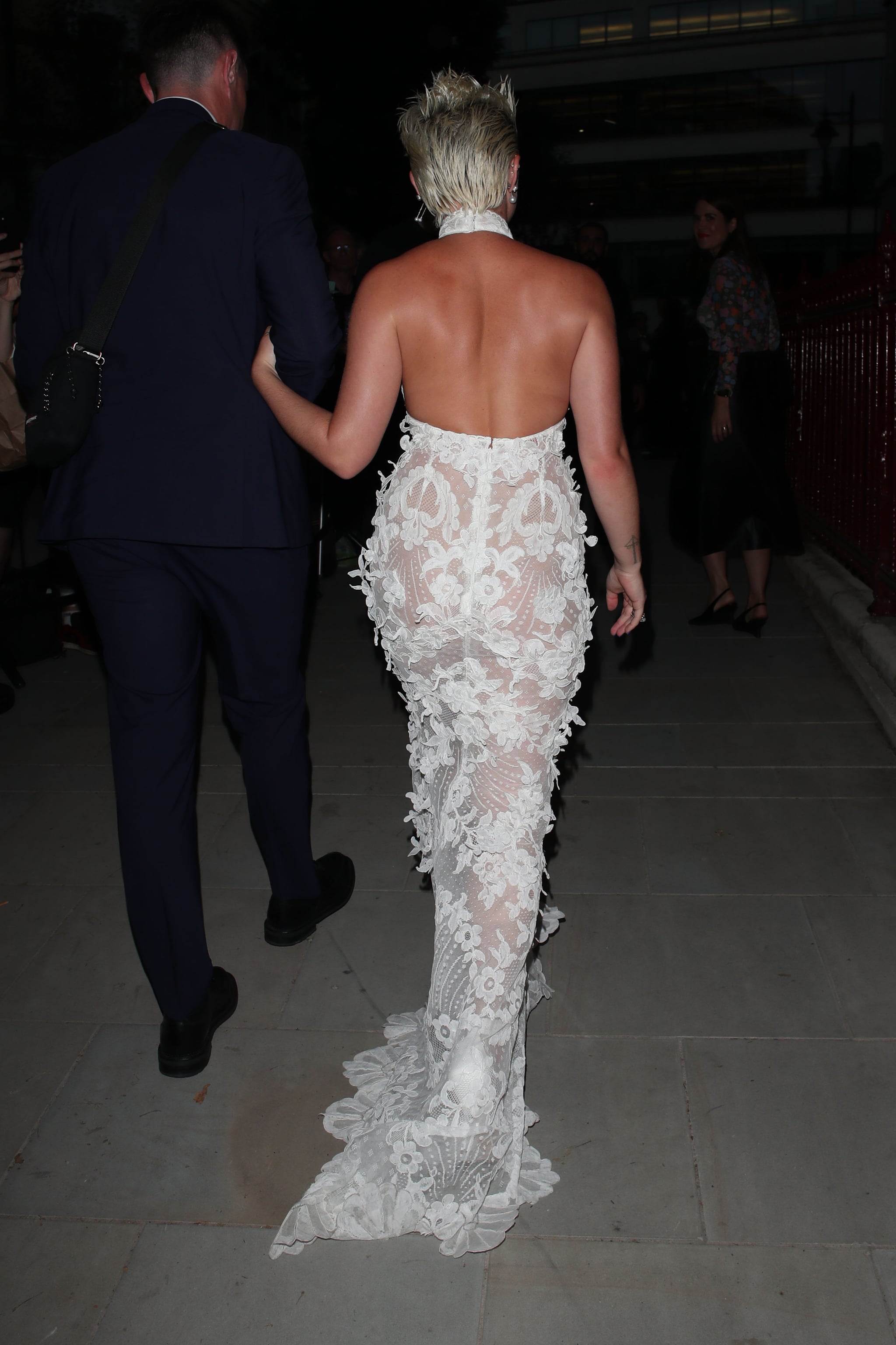 Florence Pugh gives punk bride energy in sheer white lace dress