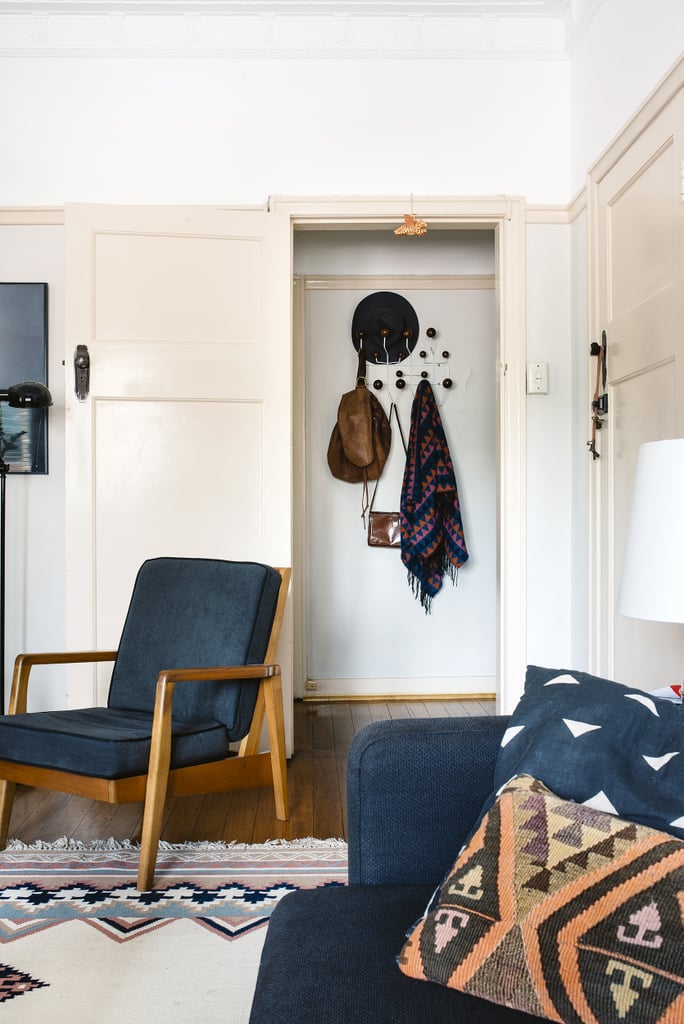 We love the mix of textiles and prints in the living room.