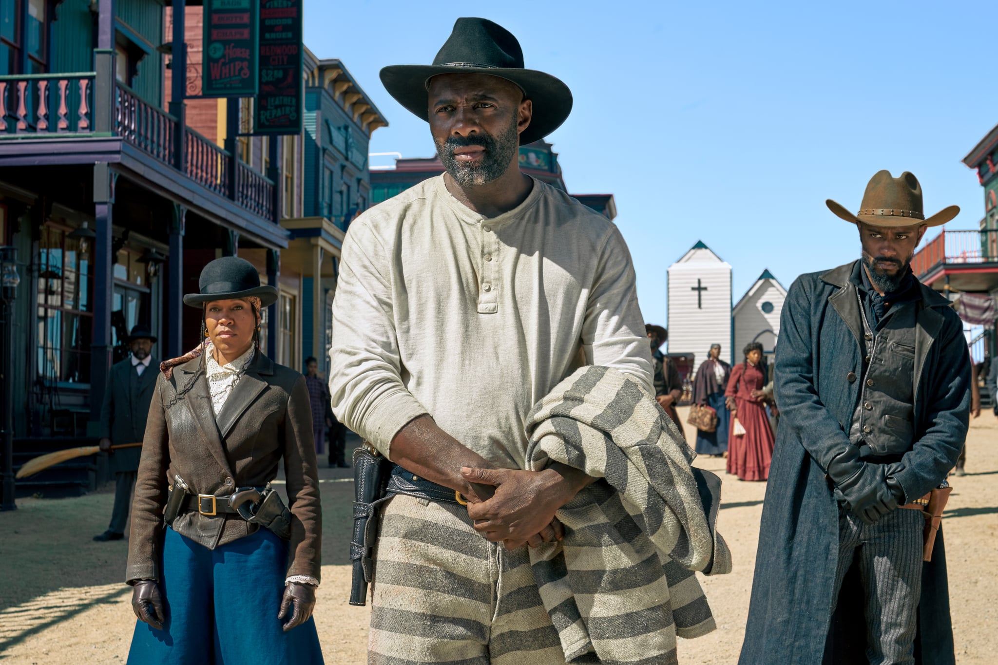THE HARDER THEY FALL (L to R): REGINA KING as TRUDY SMITH, IDRIS ELBA as RUFUS BUCK, LAKEITH STANFIELD as CHEROKEE BILL. CR: DAVID LEE/NETFLIX†© 2021