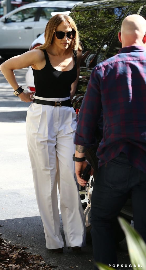 Jennifer Lopez Black Bodysuit and White Trousers