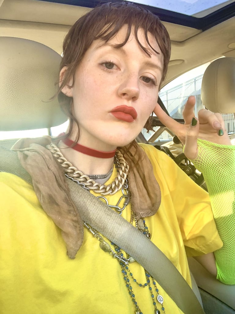 "All my necklaces + a thrifted yellow tee."