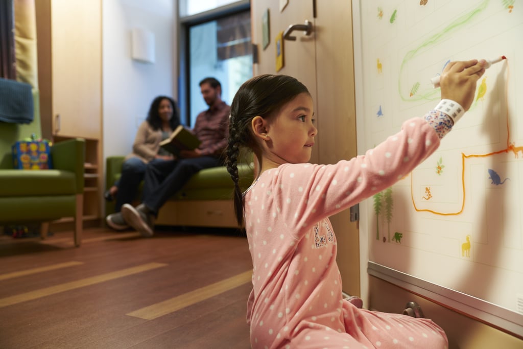 Patient rooms in the new building offer creative outlets for young artists.