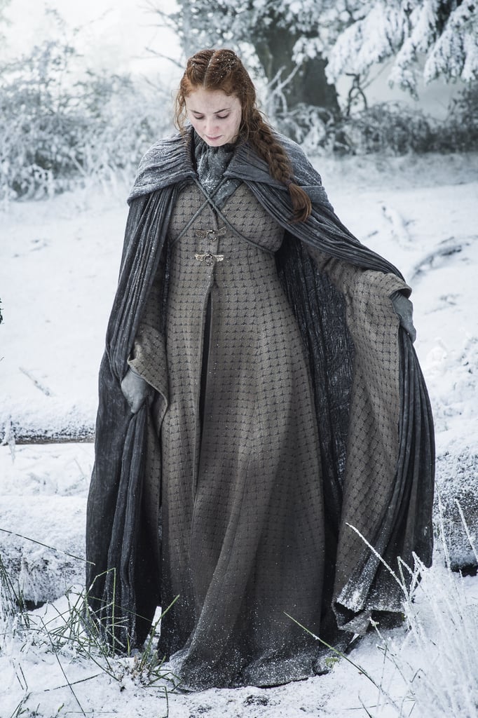 Sansa knows that running through the woods in the snow requires plenty of layers.
