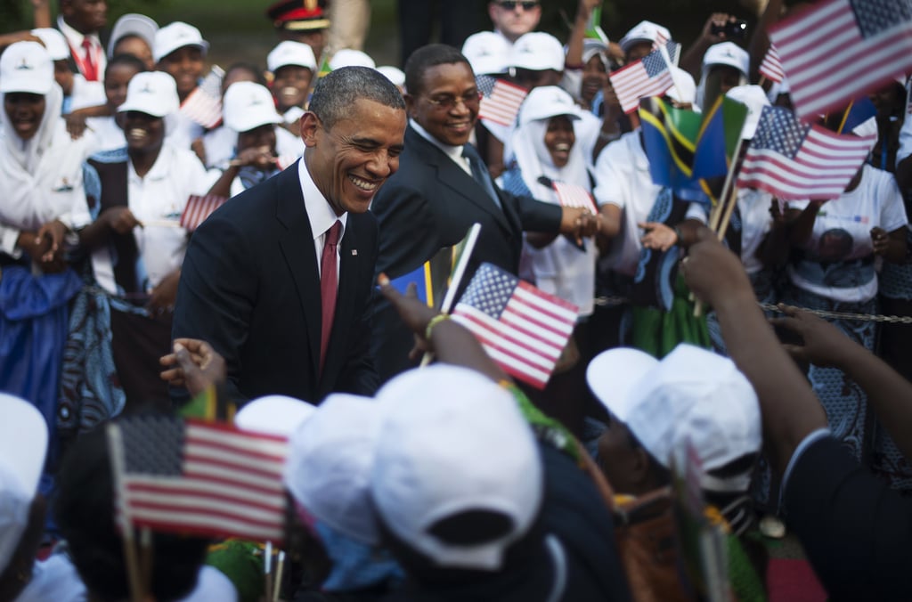President Obama shook hands with onlookers before a welcoming ceremony in Tanzania in July 2013.