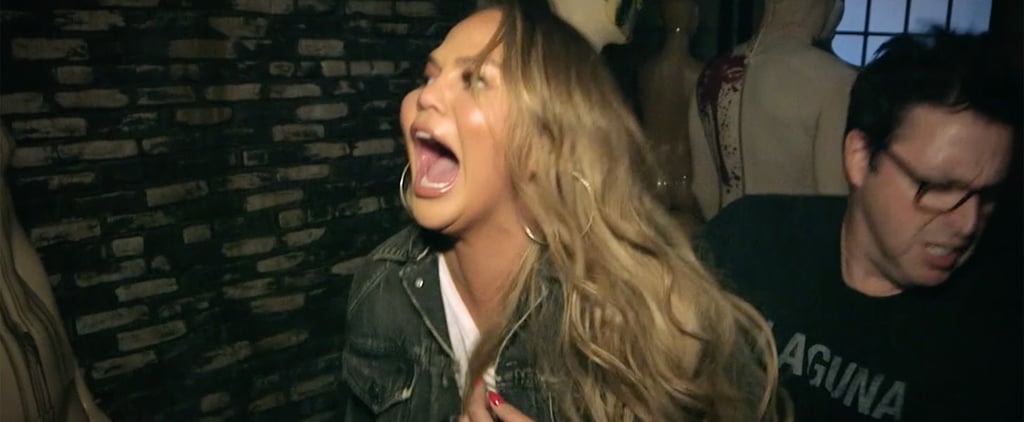 Chrissy Teigen Tries (and Fails) to Keep It Together While Going Through The Purge Maze