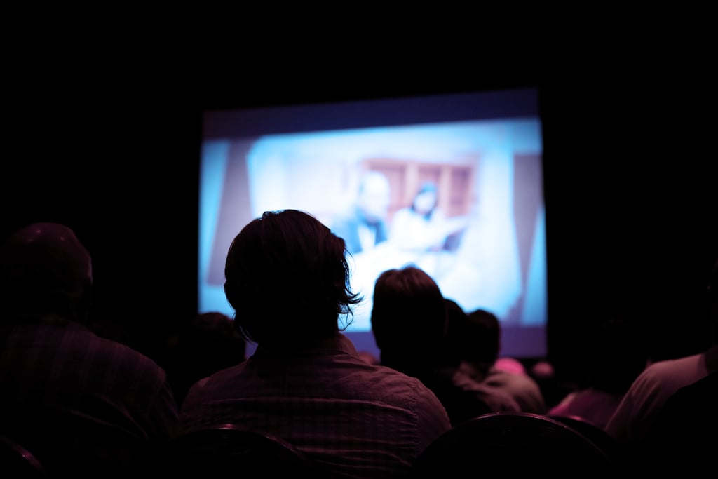 Go to a foreign film night. They usually host one at a school or the library.