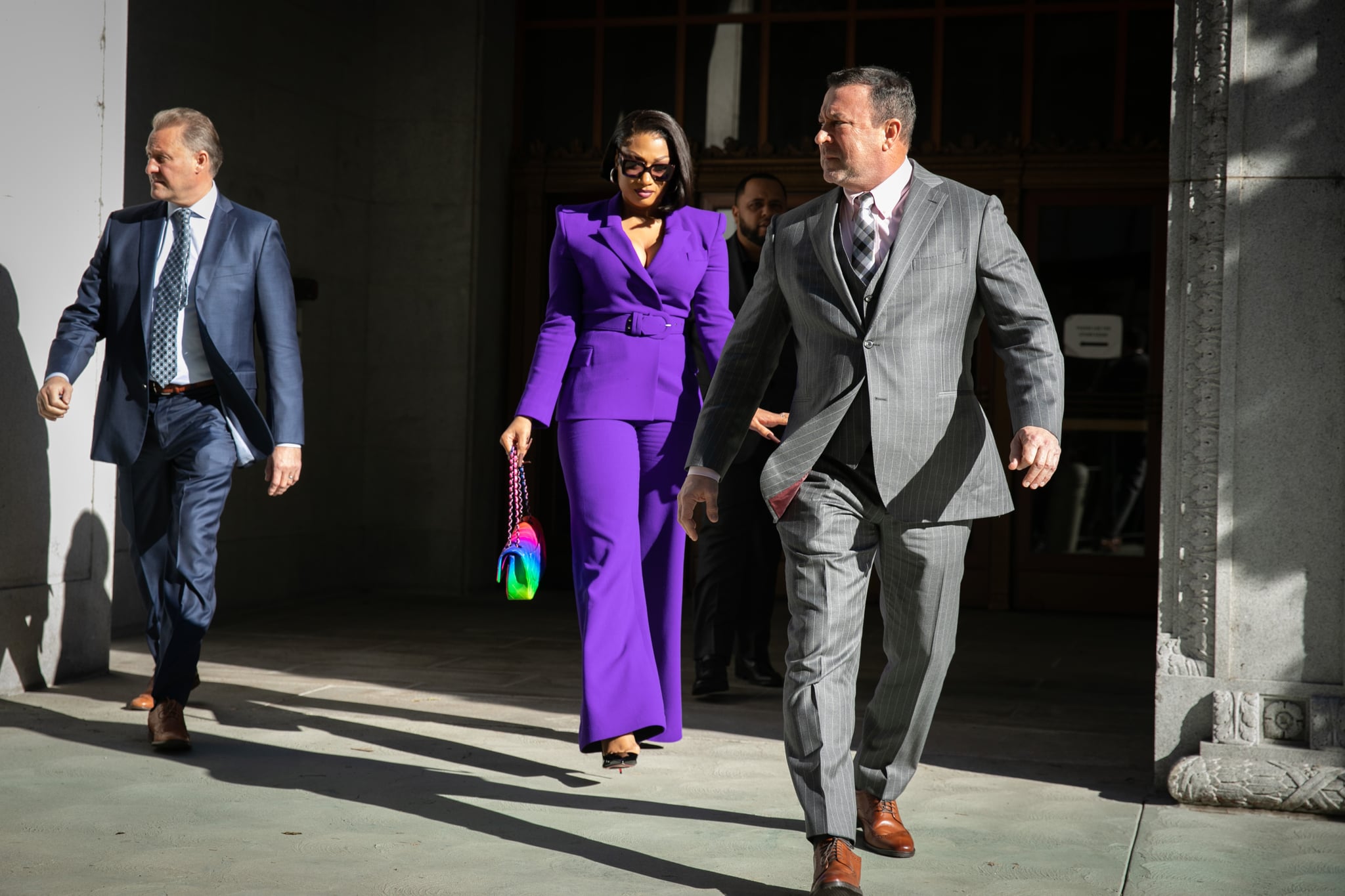 LOS ANGELES, CA - DECEMBER 13: Megan Thee Stallion whose legal name is Megan Pete makes her way from the Hall of Justice to the courthouse to testify in the trial of Rapper Tory Lanez for allegedly shooting her on Tuesday, Dec. 13, 2022 in Los Angeles, CA. (Jason Armond / Los Angeles Times via Getty Images)