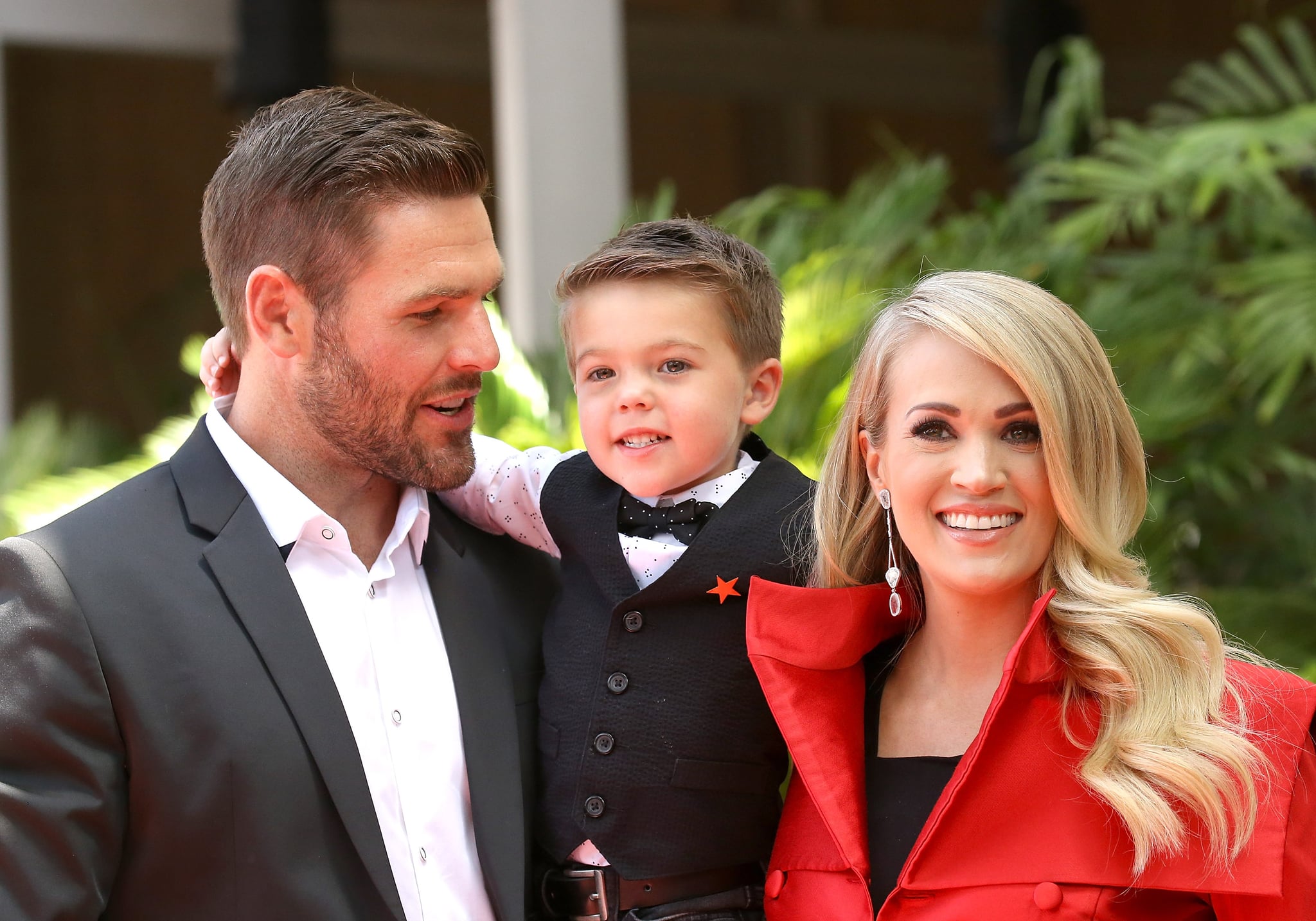 HOLLYWOOD, CA - SEPTEMBER 20:  Carrie Underwood with her husband, Mike Fisher and their son, Isaiah Michael Fisher attend the ceremony honouring Carrie Underwood with a Star on The Hollywood Walk of Fame held on September 20, 2018 in Hollywood, California.  (Photo by Michael Tran/FilmMagic,)
