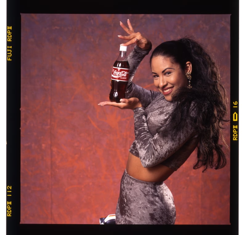 Selena in Silver Velour Pants and a Matching Crop Top For a Coca-Cola Campaign in 1994