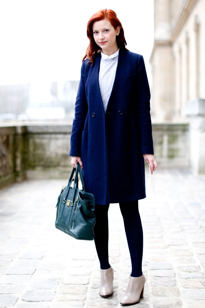 Our fashion news editor Christina Pérez was snapped showing off a minimalist-prep look outside the show.
Our fashion news editor Christina Pérez was snapped showing off a minimalist-prep look outside the show.