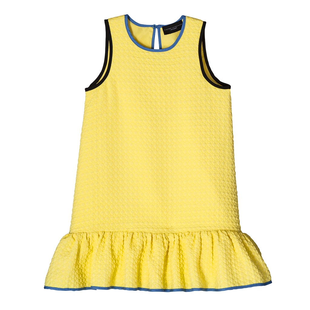 蹒跚学步的女孩的黄色Cloque裙(23美元)。