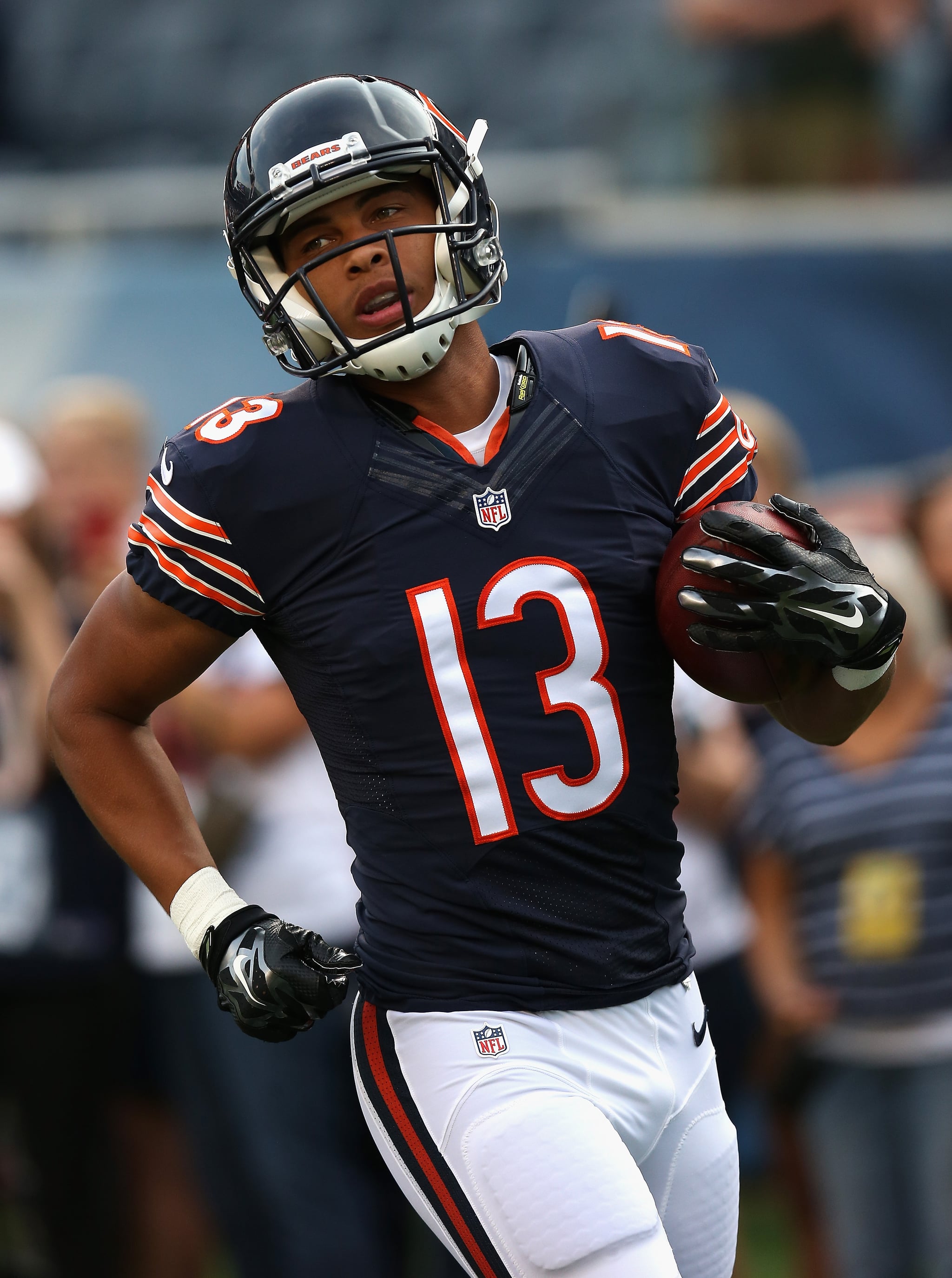 CHICAGO, IL - AUGUST 08:  Dale Moss #13 of the Chicago Bears participates in warm-ups before a preseason game against the Philadelphia Eagles at Soldier Field on August 8, 2014 in Chicago, Illinois. The Bears defeated the Eagles 34-28.  (Photo by Jonathan Daniel/Getty Images)