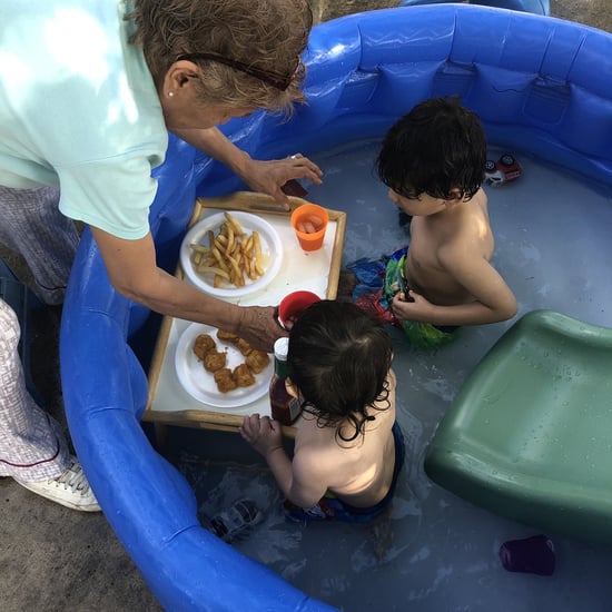 Grandma Feeds Grandkids While in the Kiddie Pool